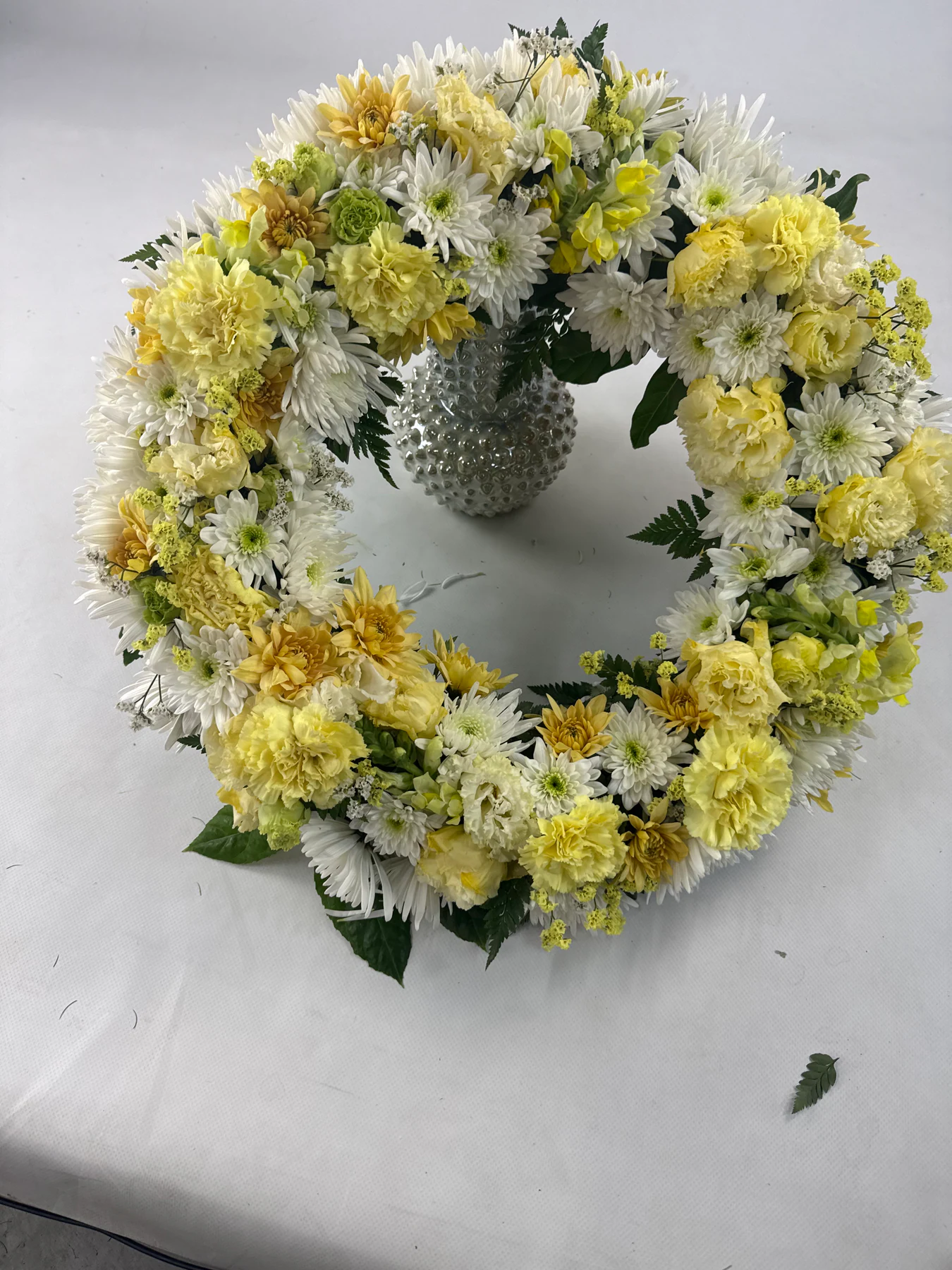 Coroa de flores naturais criada pela Flor & Pão